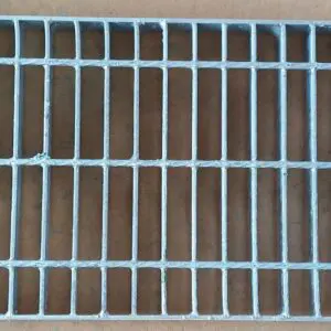 A close up of the bottom of a metal grate