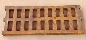 A wooden tray with 1 2 holes for the bottom.