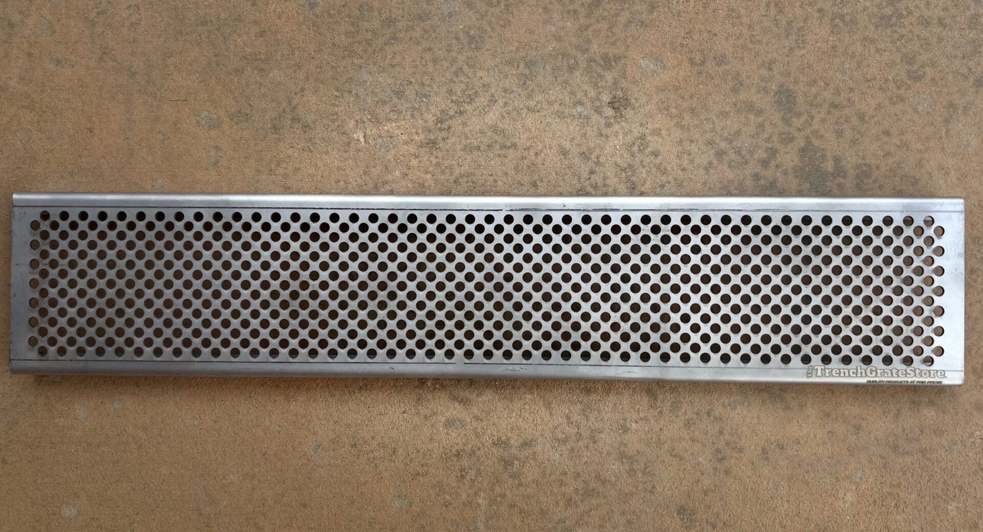 A metal bar with black and white checkered pattern.