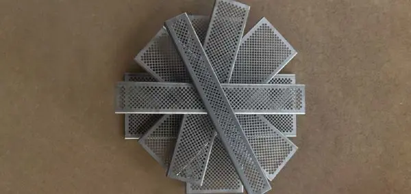 A bunch of metal squares sitting on top of each other