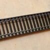 A close up of the bottom of a train track