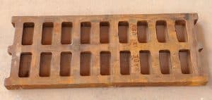 A wooden grate that is made of wood.