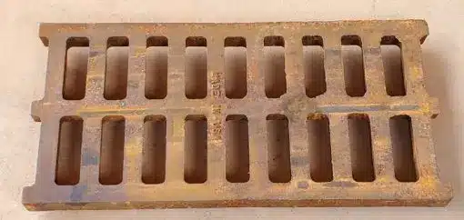 A close up of the bottom of a grate