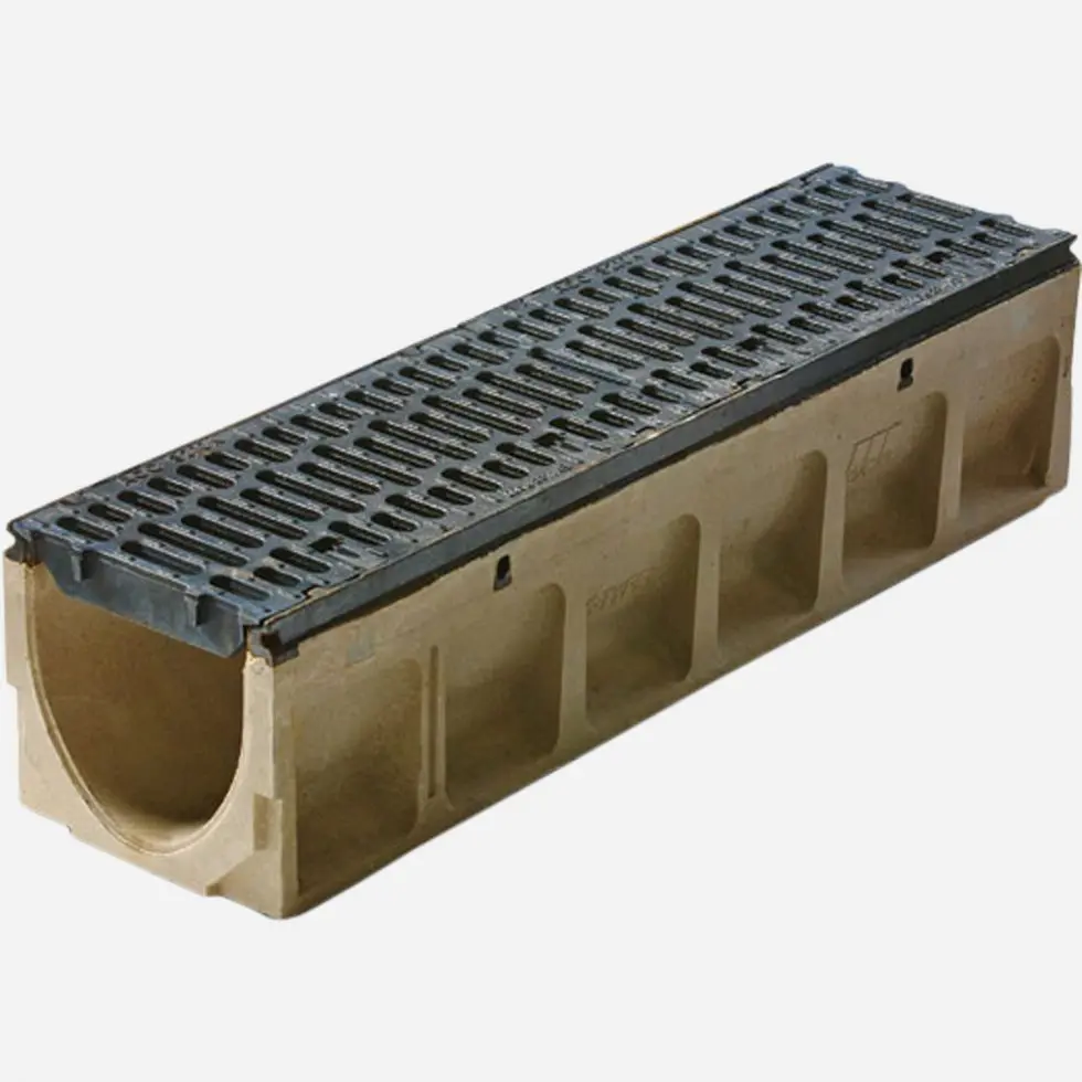 A plastic trench drain with a concrete block