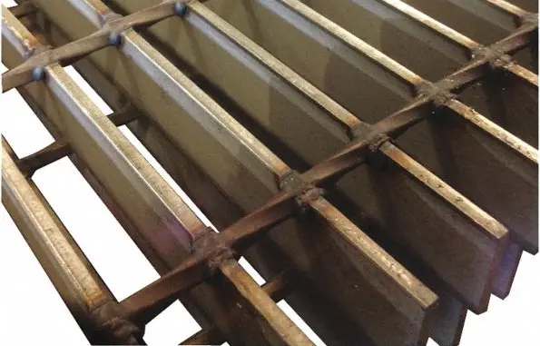 A close up of the bars on a metal structure