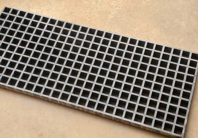 A close up of the bottom of a metal grate