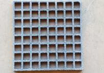 A close up of the bottom of a grate