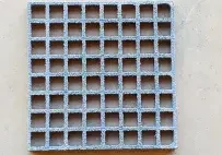 A close up of the bottom of a grate